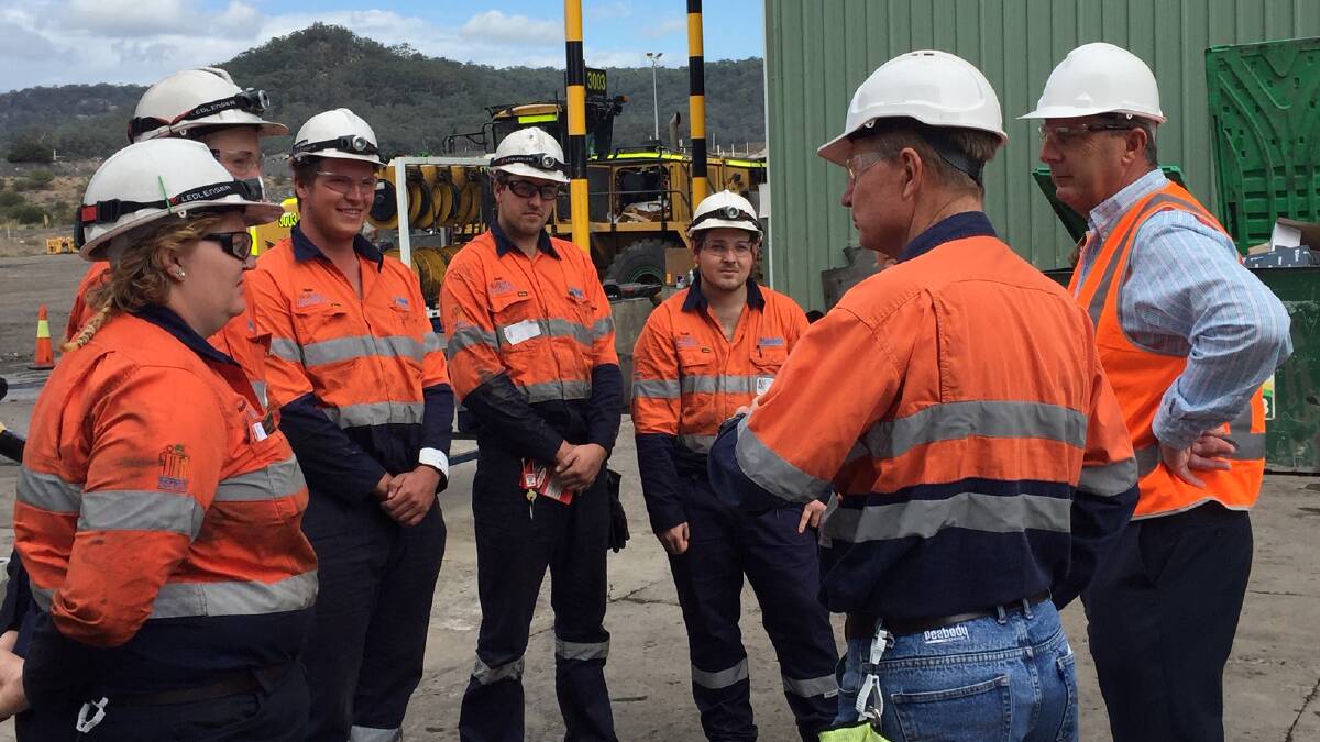 Member for Upper Hunter Michael Johnsen MP and Wilpinjong general manager Blair Jackson meet with the mine's the new apprentices.