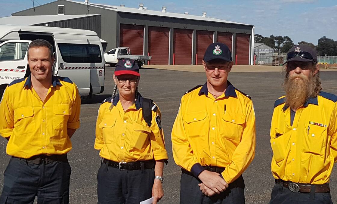 FIRST CREW: Cudgegong RFS District volunteers deployed to Queensland, from left, James Manners (Lawson), Suzanne Duggan (Cooyal), James Cooper (Lawson) and John Pearse (Lawson). Photo: Cudgegong RFS