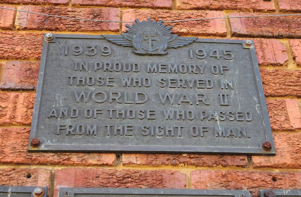 The plaque signalling the status of the tower as a memorial.