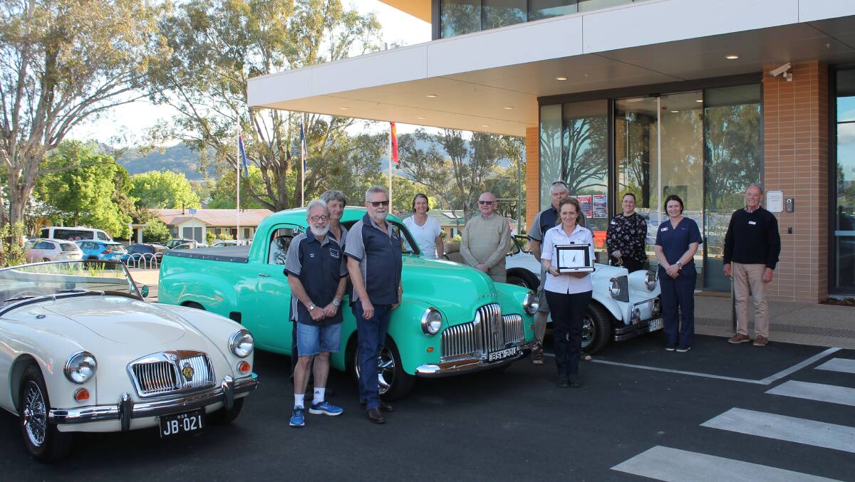Representatives of the Cudgegong Cruisers, Mudgee Health Council and Health Service, with the General Examination Camera.