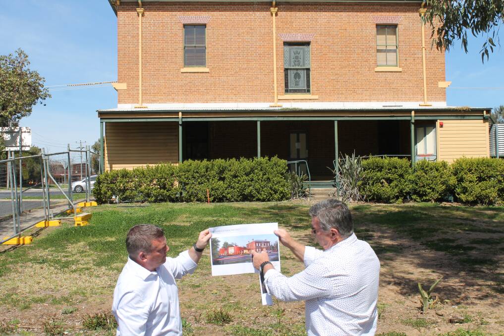 State Member Dugald Saunders and Mayor Des Kennedy with plans for the Cultural Precinct at the site.