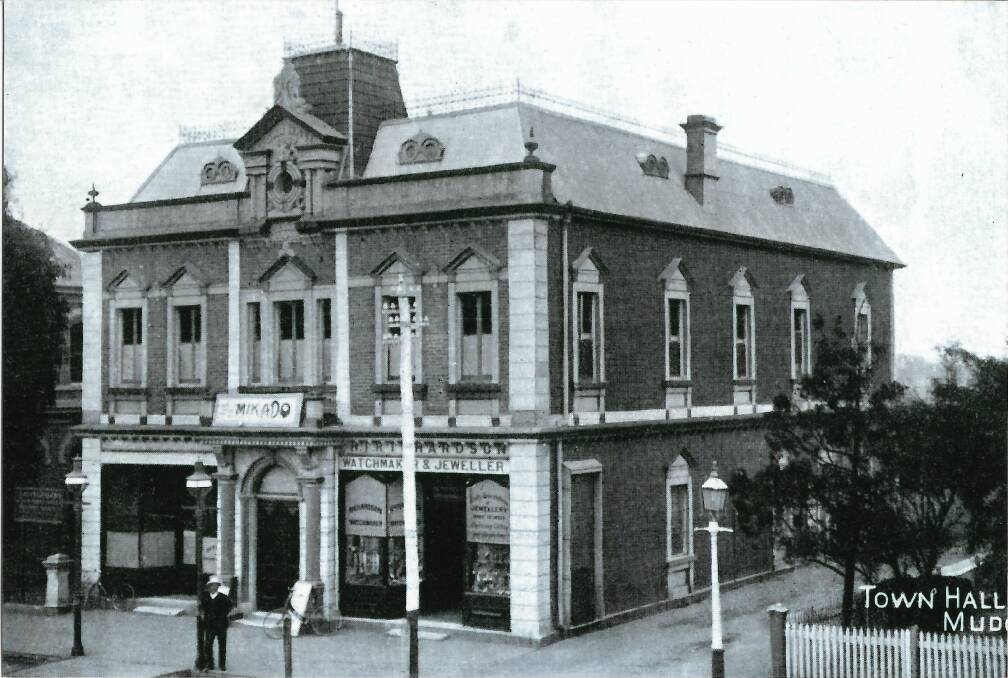 This photo shows the building before it was extended at the rear, the sign above the door is for a performance of The Mikado, courtesy of Mudgee Historical Society.