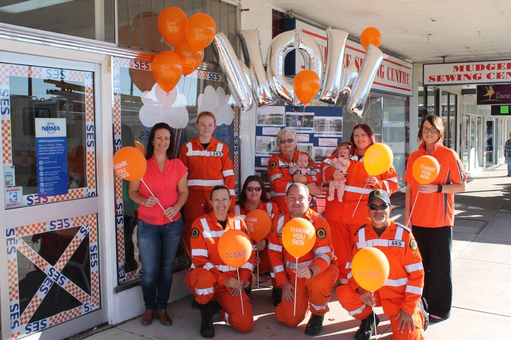 Members of the Mudgee SES Unit at the local NRMA branch, one of the workplaces that wore orange on Wednesday.