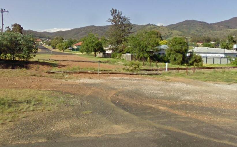 Looking south at where Cox Street is bisected by the rail line, photo Google Maps.