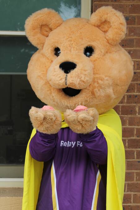 CAN'T STOP AT ONE: The Cancer Council's Dougal is also a fan of local Relay For Life team Strictly Legal's cake stall.