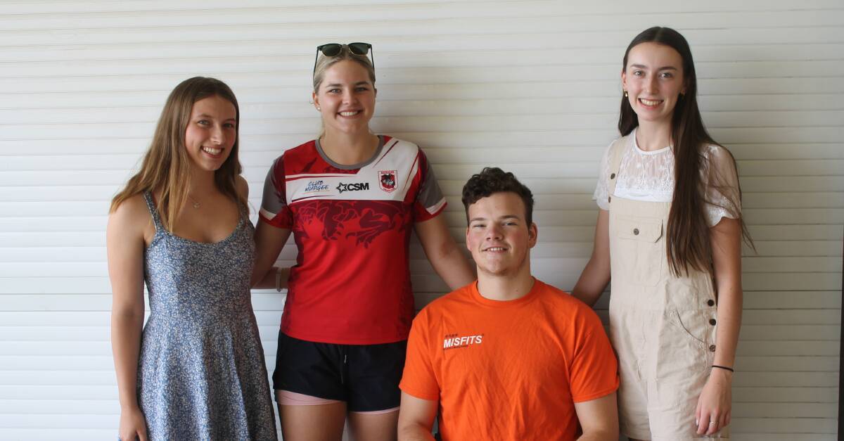 SMILES: Students who achieved Band 6s, Sophie Middleton, Georgia Ward, Jarrod Emeny and Rose Parker. Absent - Jasmine Broadfoot, Michala Brown and Alyssa Chua. Photo: Sam Potts