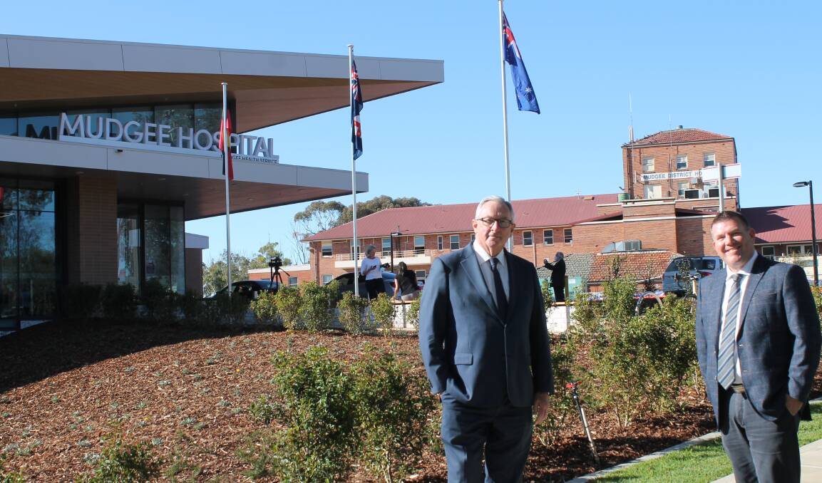 Health Minister Brad Hazzard and Member for Dubbo Dugald Saunders at the new Mudgee Hospital while its predecessor still stands adjacent.