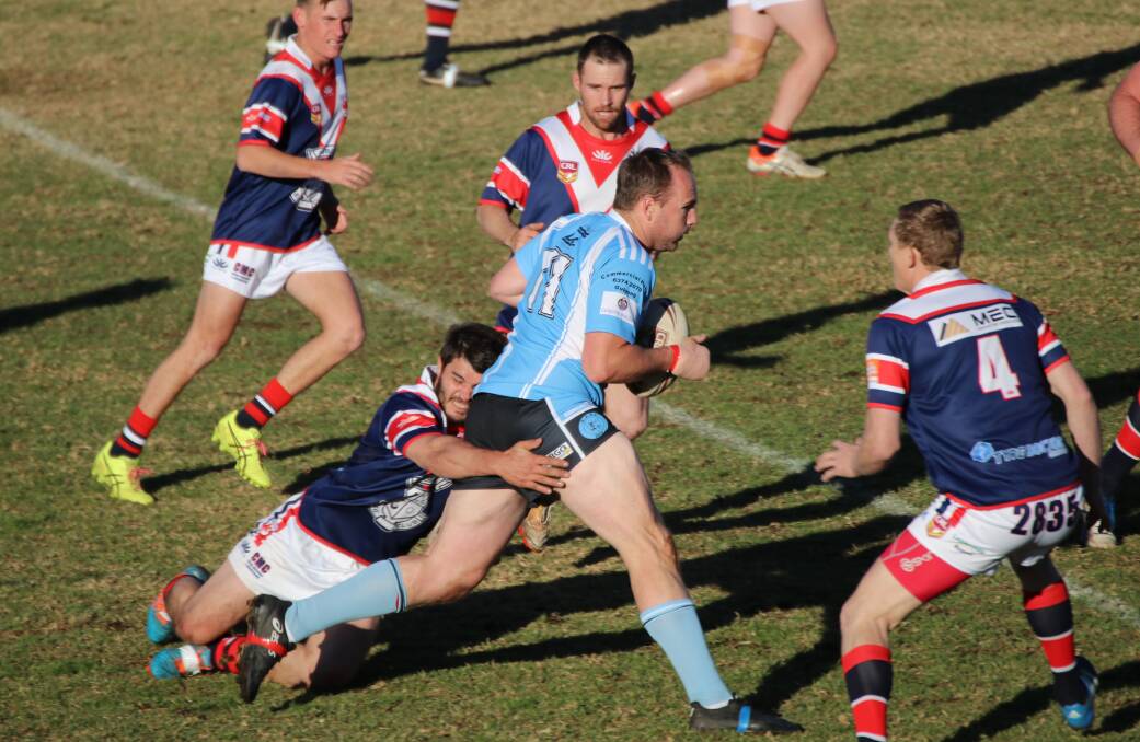 Gulgong second rower Dave Morrison carries the ball up against Cobar on Saturday, photo courtesy of Sharon Harland of the Cobar Weekly.