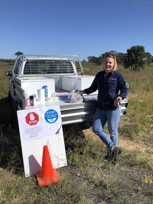 Senior biosecurity officer, Kristy Bennetts, staffs a bait delivery site during the Coronavirus lockdown.
