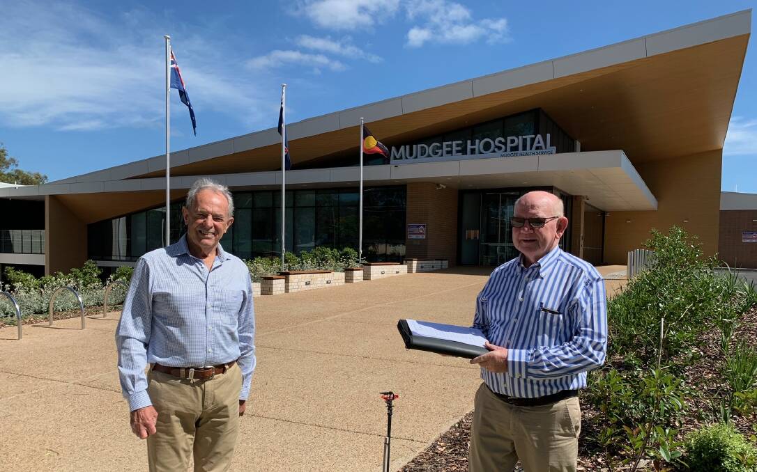 Outgoing chairman of the Mudgee Health John Bentley (left), who's handed over the reins to Joe Sullivan.