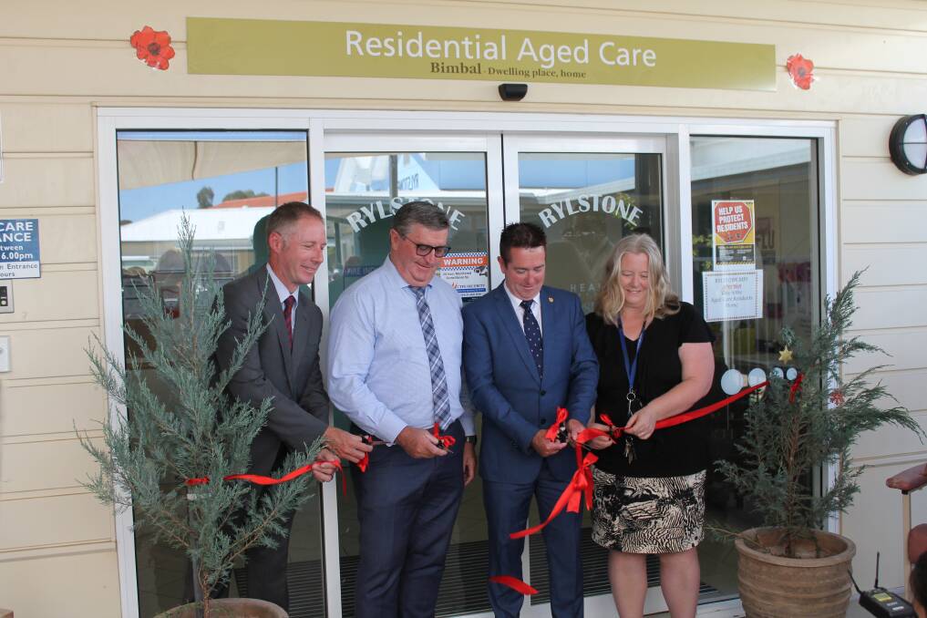 WNSWLHD Chief Executive Scott McLachlan, Mayor Des Kennedy, Paul Toole MP, and Rylstone Health Services Manager Susan Gawthorne, cut the ribbon.
