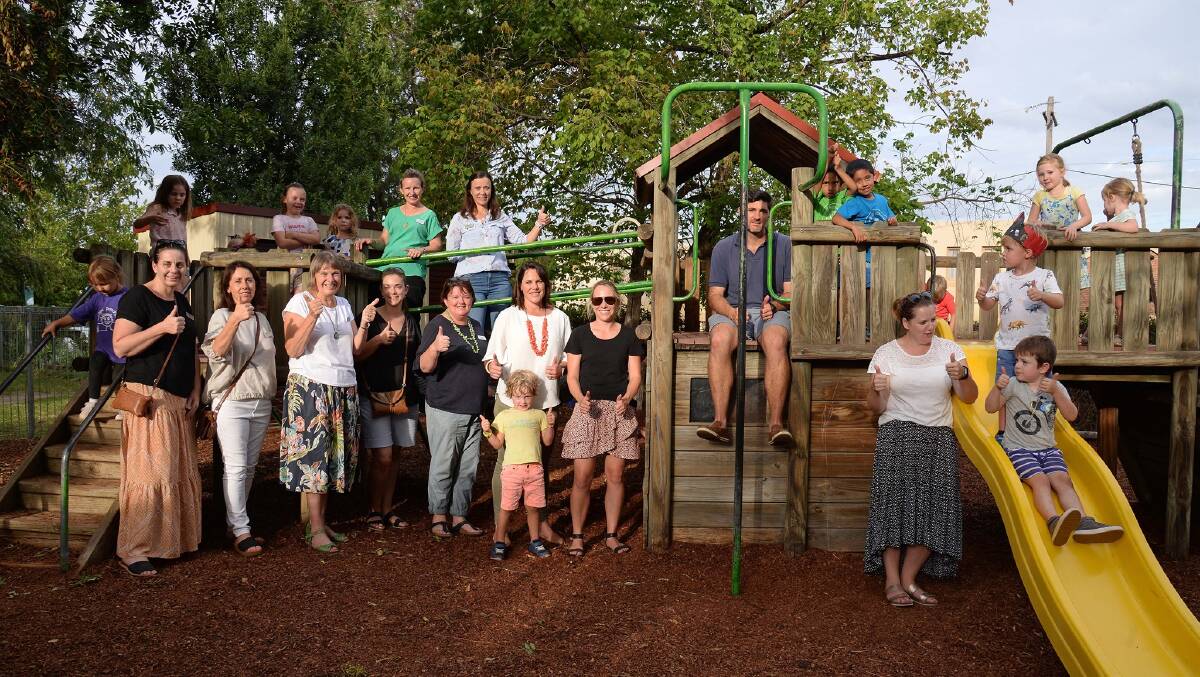 Families and staff farewell the old fort in the playground at the Lovejoy Street Preschool, earlier this year.