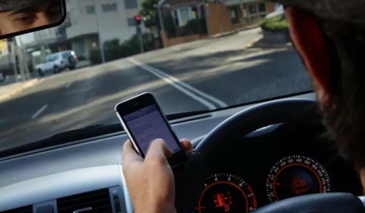 Drivers will lose five points for illegal mobile phone use, photo Ken Robertson.