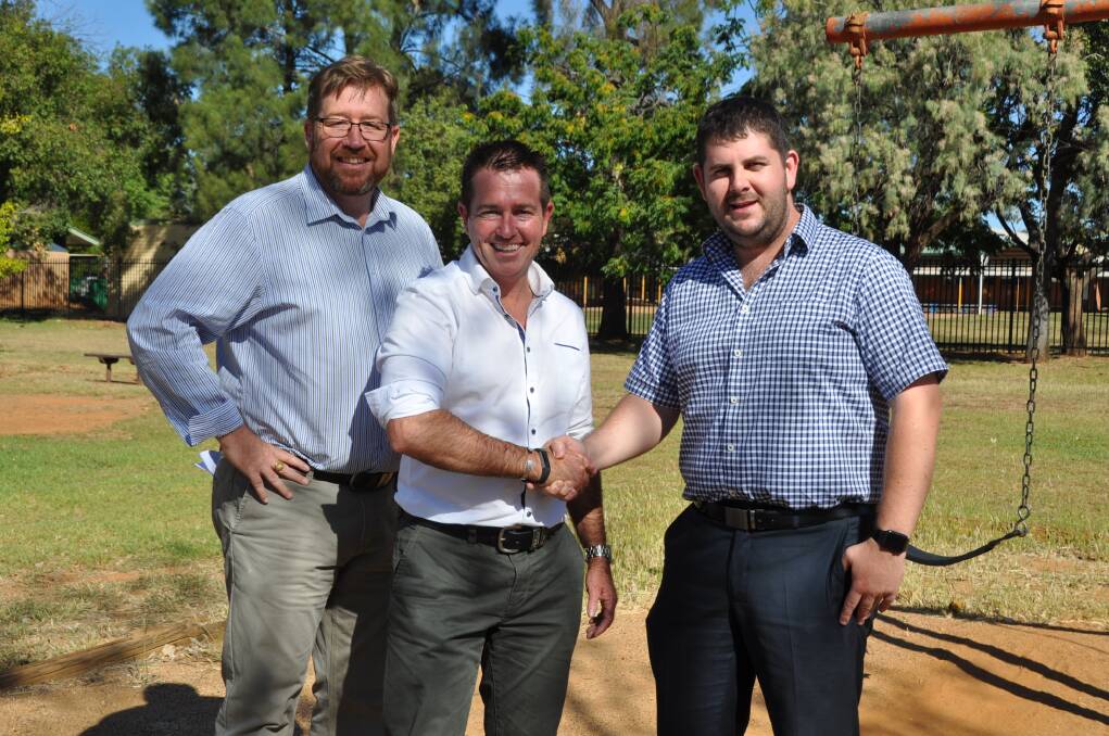 SHAKE ON IT: Member for Dubbo Troy Grant, Minister for Racing Paul Toole, and Deputy Mayor Paul Cavalier.