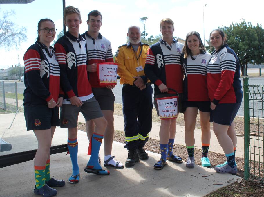 MHS Rainbow Day 2019 is raising money for equipment for the Cudgegong RFS, specifically the RAFT of which Jamie Hudson (centre) is a member, note that Wednesday was 'sandals and socks day' - an early fundraiser at the school.