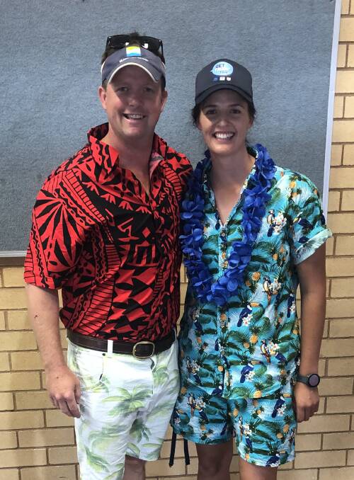 Movember Tropical Tuesday guest speaker Andy Gay and MHS teacher Miss Messner.