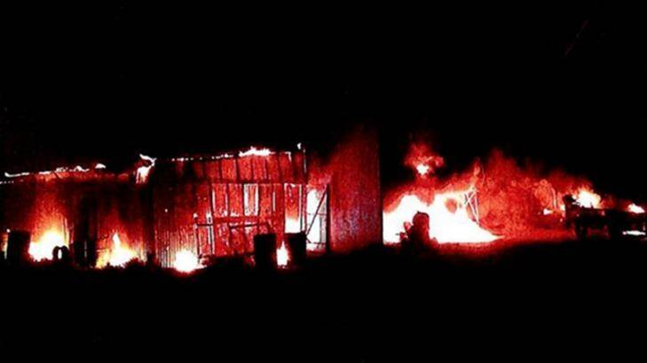 A shed set alight by Mark and Gino Stocco on a property in Canowindra, in the state's central west, in 2014.  Photo: supplied