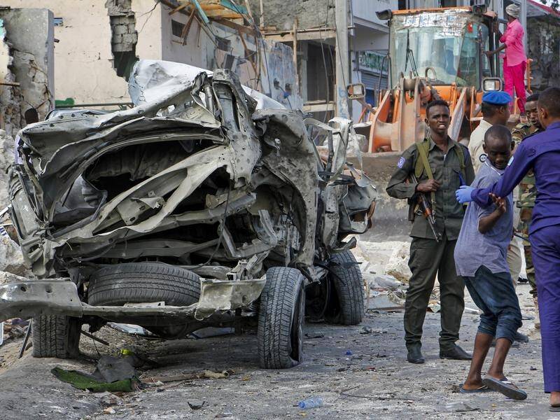 Al-Qaeda-linked extremist group al-Shabab has claimed responsibility for two blasts in Mogadishu.