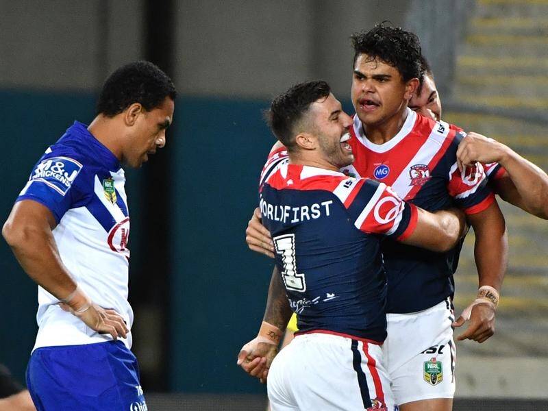 Latrell Mitchell (R) has scored the only try in the Sydney Roosters' 6-0 NRL win over Canterbury.