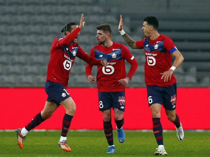 Lille have celebrated their equaliser from Jose Fonte (l) in their home draw with Strasbourg.