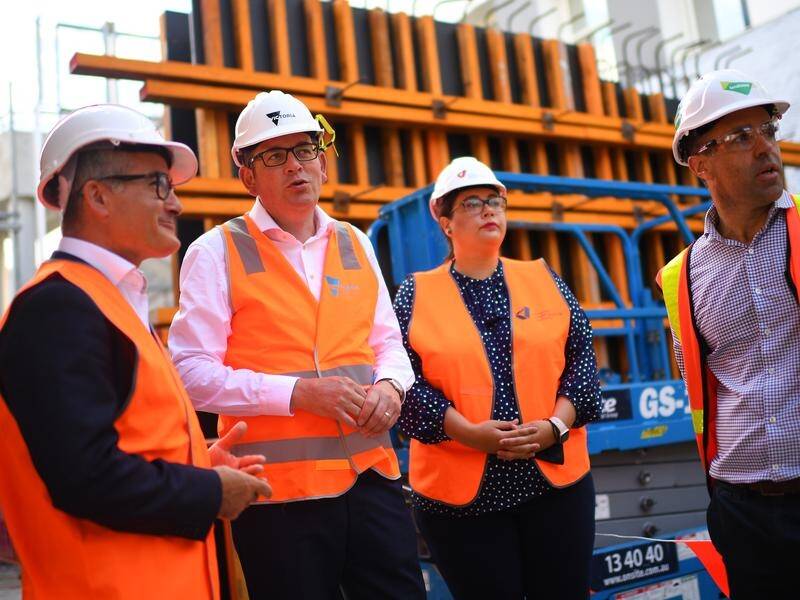 Daniel Andrews (second left) has visited the site for an acute mental health facility in Melbourne.
