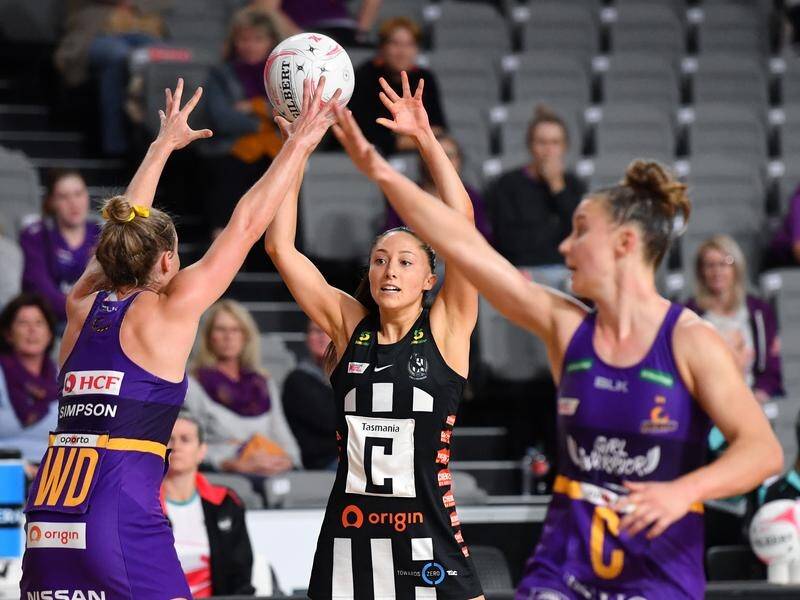 Molly Jovic (centre) starred in Collingwood's Super Netball win over Queensland Firebirds.