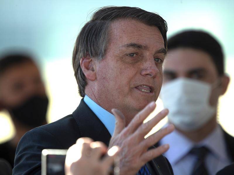 Brazil's President Jair Bolsonaro wants COVID-19 isolation orders lifted despite virus deaths.