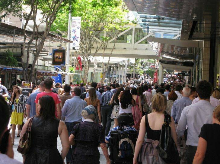 Generic shoppers in Brisbane's Queen Street Mall. QueensPlaza crowds retail Christmas shopping economy National Australia Bank NAB. Brisbane Times.