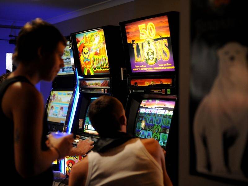 NSW pubs and clubs will have three months to remove gambling-related signage from their buildings. (Tracey Nearmy/AAP PHOTOS)
