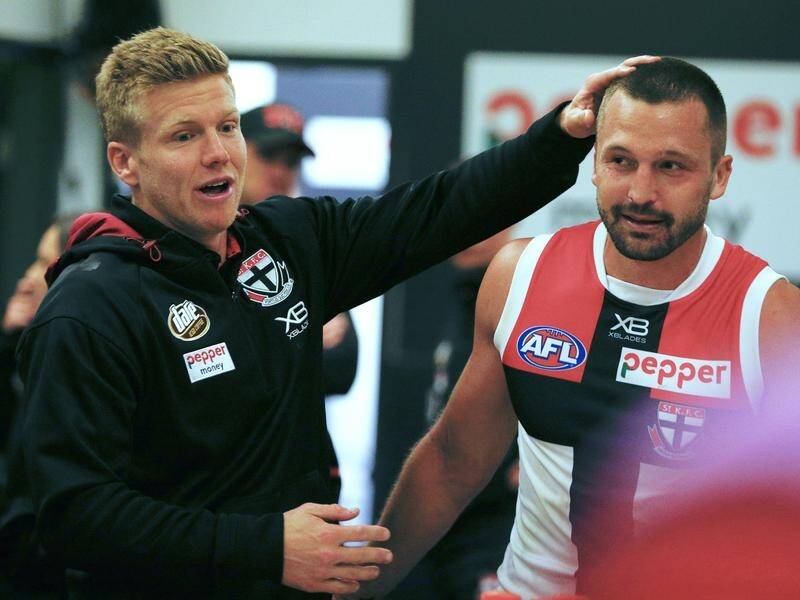 Former Sydney Swan Dan Hannebery (left) is finally able to make his AFL debut for St Kilda.