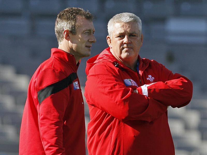 Wales coach Warren Gatland (right) has expressed shock at the ban imposed on Rob Howley (left).