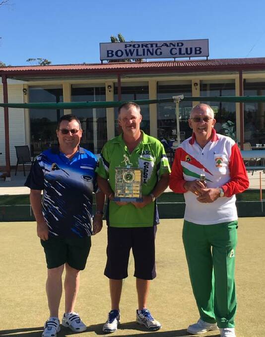 TRIPLES CHAMPS: Craig, Darrin and Noel Elbourn at Portland Bowling Club. Picture: Supplied