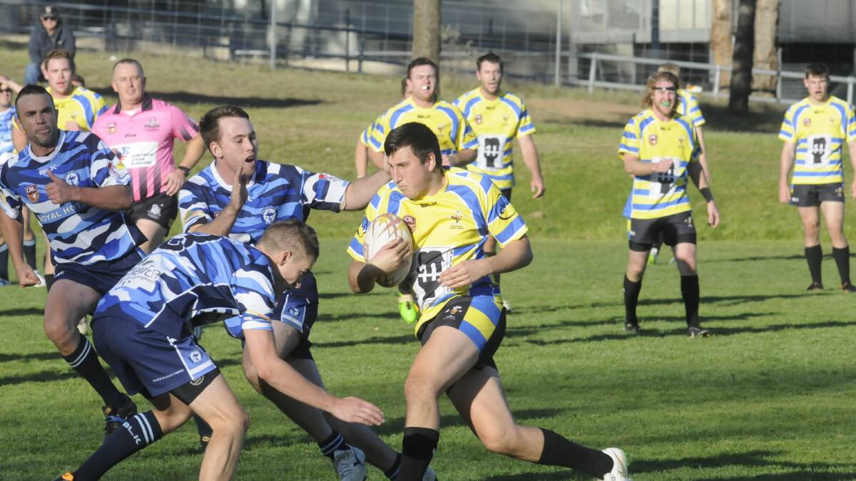 INCOMING: CSU Yellow’s Dean Hodges gets set for impact in Saturday’s 20-16 New Era Cup defeat to the Wallerawang Warriors. Photo: CHRIS SEABROOK  	051615csuleag2