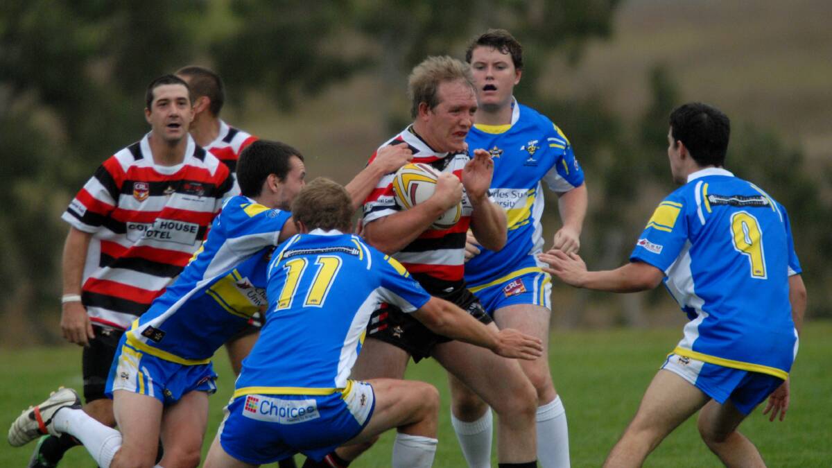 UNDERWAY IN 2014: CSU Blue and Lithgow Bears rip into their round-one Centennial Coal Cup clash on Sunday. Photo: ZENIO LAPKA