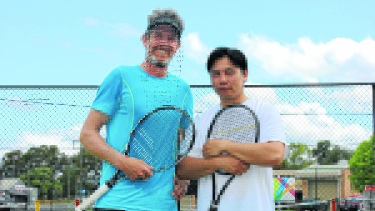 Anthony Leung (right) claimed the first Mudgee Tennis Championship in eight years yesterday after a straight sets, 6-1 6-1 victory over Angus McDonald (left). 