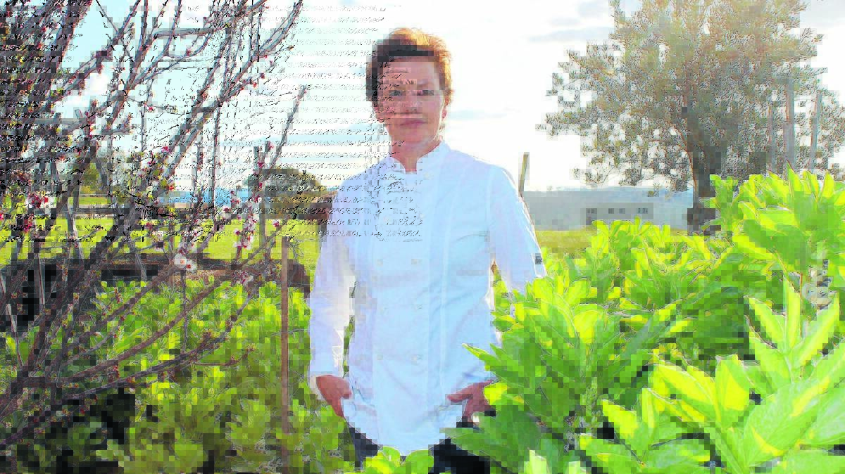 Chef Kim Currie in the garden at The Zin House, which was awarded one hat in the 2016 Sydney Morning Herald Good Food Guide.