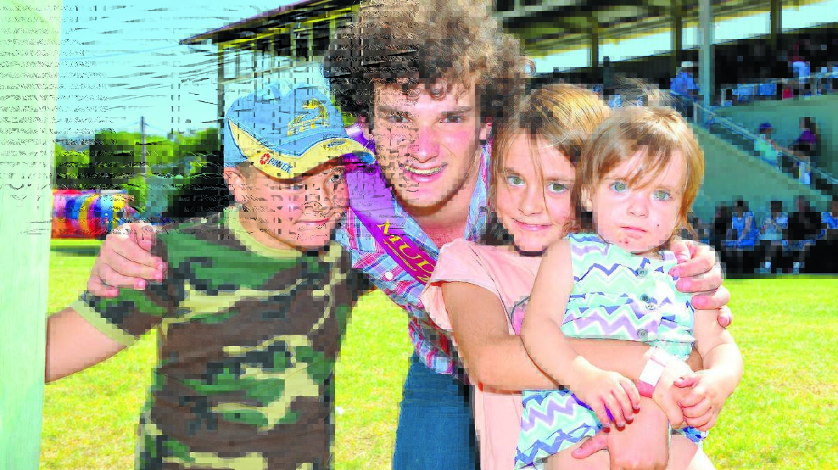 Tayzin Fahey-Leigh of Brothers 3 meeting Ricky, Alydia and Annabella Orsini at the Mudgee Show on Saturday.  Local fans have another chance to meet Tayzin and his brothers at the Lifeskills Plus Chain of Coins at the Mudgee Showground next Saturday. Photo by Col Boyd