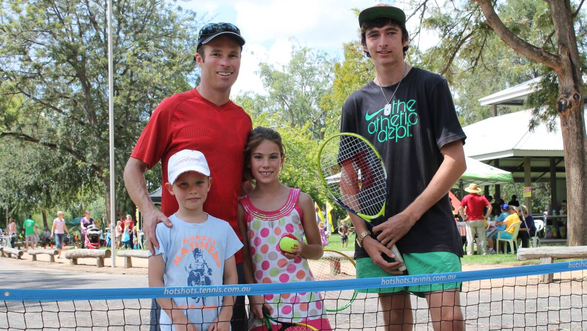 Tom, Andrew and Anthea Kearins, and Greg Parrish, at the Hot Shots tennis display at the Mudgee Health and Fitness Festival.
