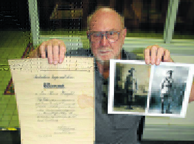Brian Hobson with the Warrant appointing J.R. Wright to the rank of Warrant Officer Class 2, signed by General Birdwood, commander of the Australian Imperial Force, and found by Mr Hobson in a suitcase he bought at a garage sale.