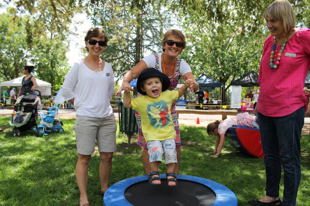 Young Charlie Pye has a jump. He is pictured with Maree Parker (left) and Rosie Gibbs (right) of Mudgee Preschool and Jane Roberts of Smart Move Physio.