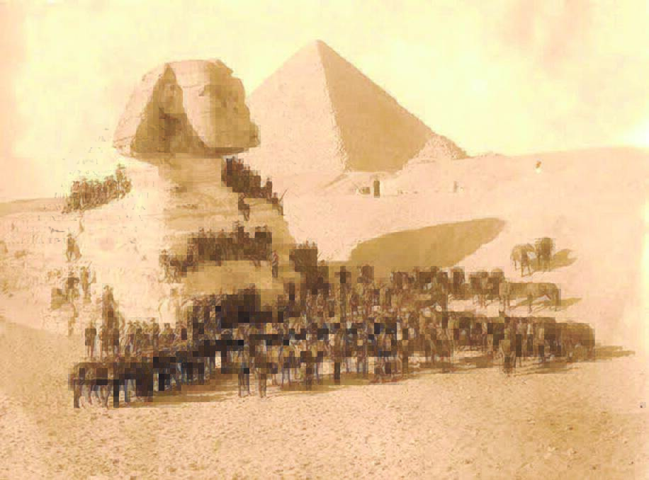 The 1st Field Company Engineers, possibly including Sapper Ernest Tubbenhauer, pose for a photo with The sphinx and one of the pyramids. Photo courtesy Tubbenhauer family