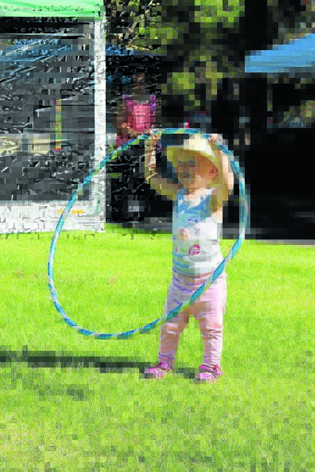 Brielle Hayes had some fun with a giant hula hoop.