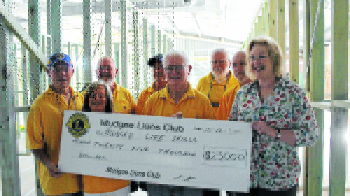 Mudgee Lions Club donated $25,000 to LifeSkills Plus CEO Carolyn Peek on Monday. PHOTO: DARREN SNYDER