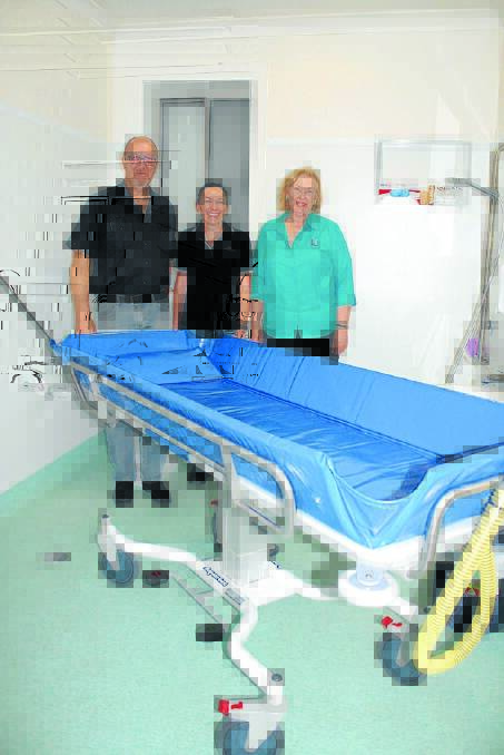 Lifeskils Plus Business & Community Liaison Officer Bob Lejeune, Ulan Underground fitness for work co-ordinator and Lifeskills Plus CEO Carolyn Peek with the aqua bed acquired with a donation from Glencore/Ulan Coal for use at Lifeskills Plus’ new community centre.