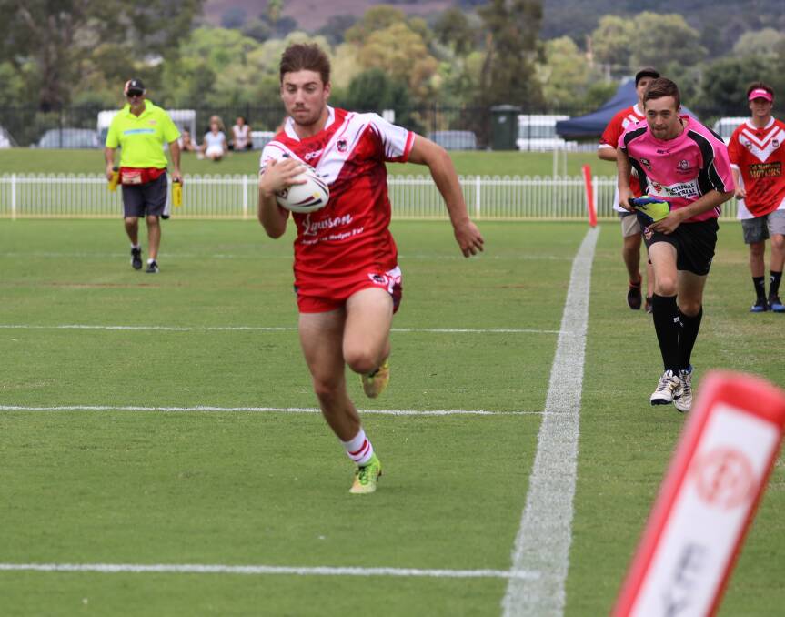RED SPEEDSTER: Nathan Orr on the breakaway for the Mudgee Dragons at the Rugby League 9s tournament at Glen Willow earlier in the year.