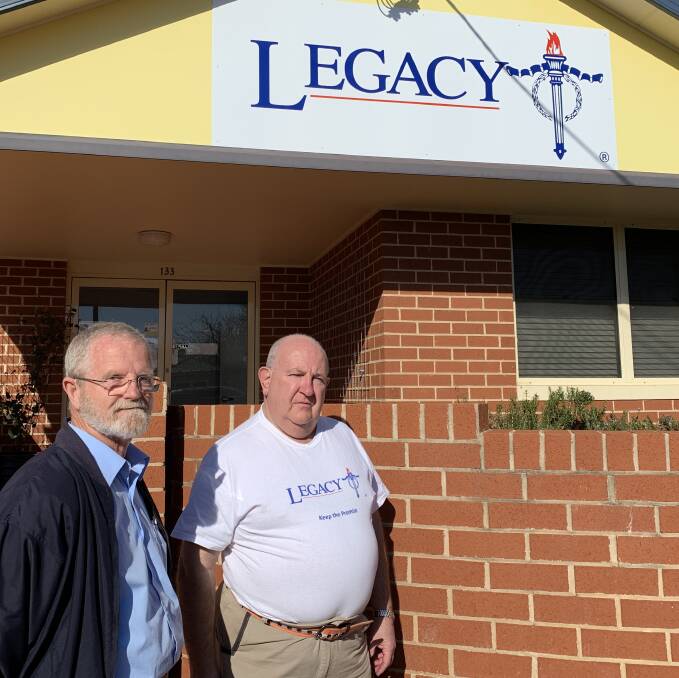Rob Duffy from Image Signs in Mudgee standing with President of Mudgee Northwest Legacy, Rodger Howard.