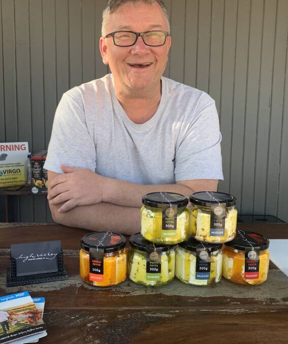 Shaun Barry of High Valley Cheese Co. with their range of award-winning feta cheeses. Photo: Benjamin Palmer