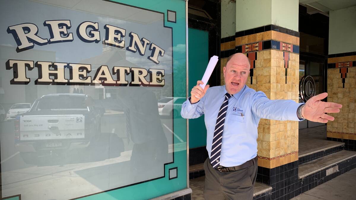 SOLD!: Tim O'Brien, Principal and Auctioneer at Mudgee First National Real Estate reenacts the moment the buiding sold.