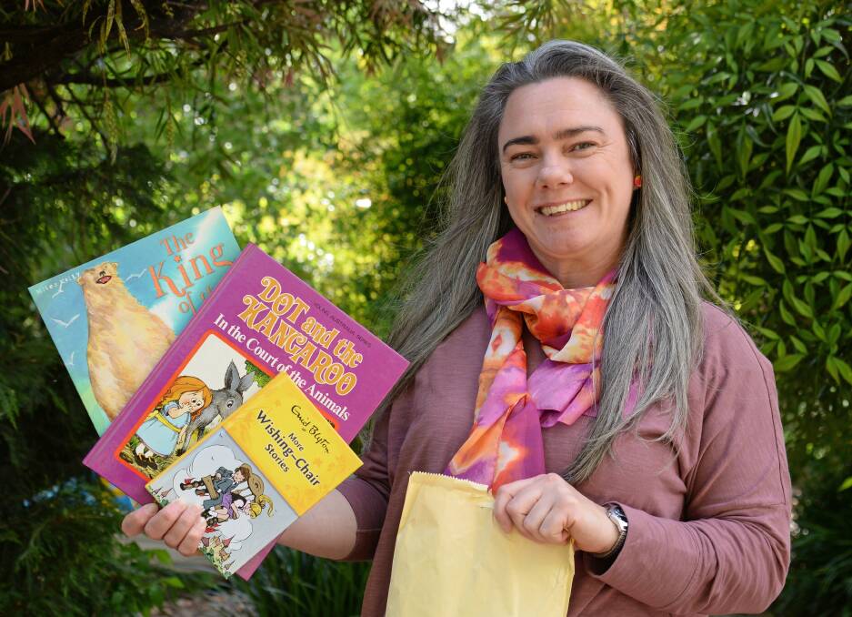 Danette - still with all her hair - organised a sale of second hand books at Mudgee Preschool to raise more money for Pink Up Mudgee and the Leukaemia Foundation. Photo: Supplied
