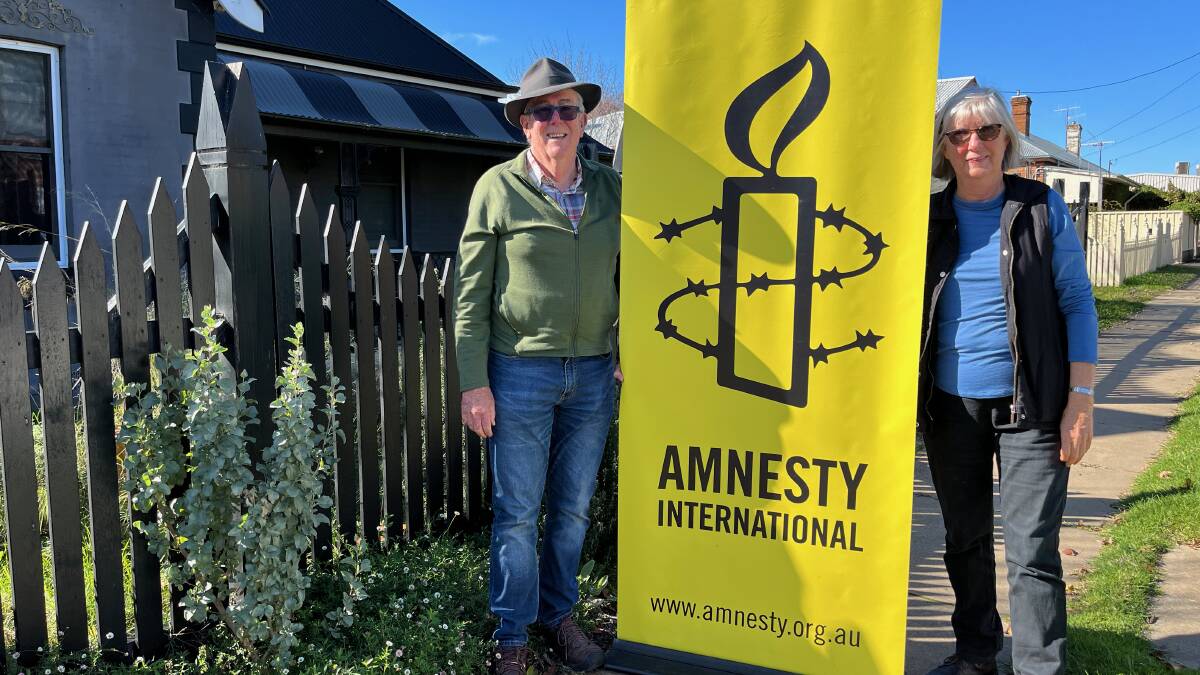 Ross Mayberry and Heather Drew from Mudgee's Amnesty outside the location where the garage sale will be held. Picture: Benjamin Palmer